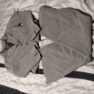My Michelle women's pant suit. Jacket is a large and the pants are size 9